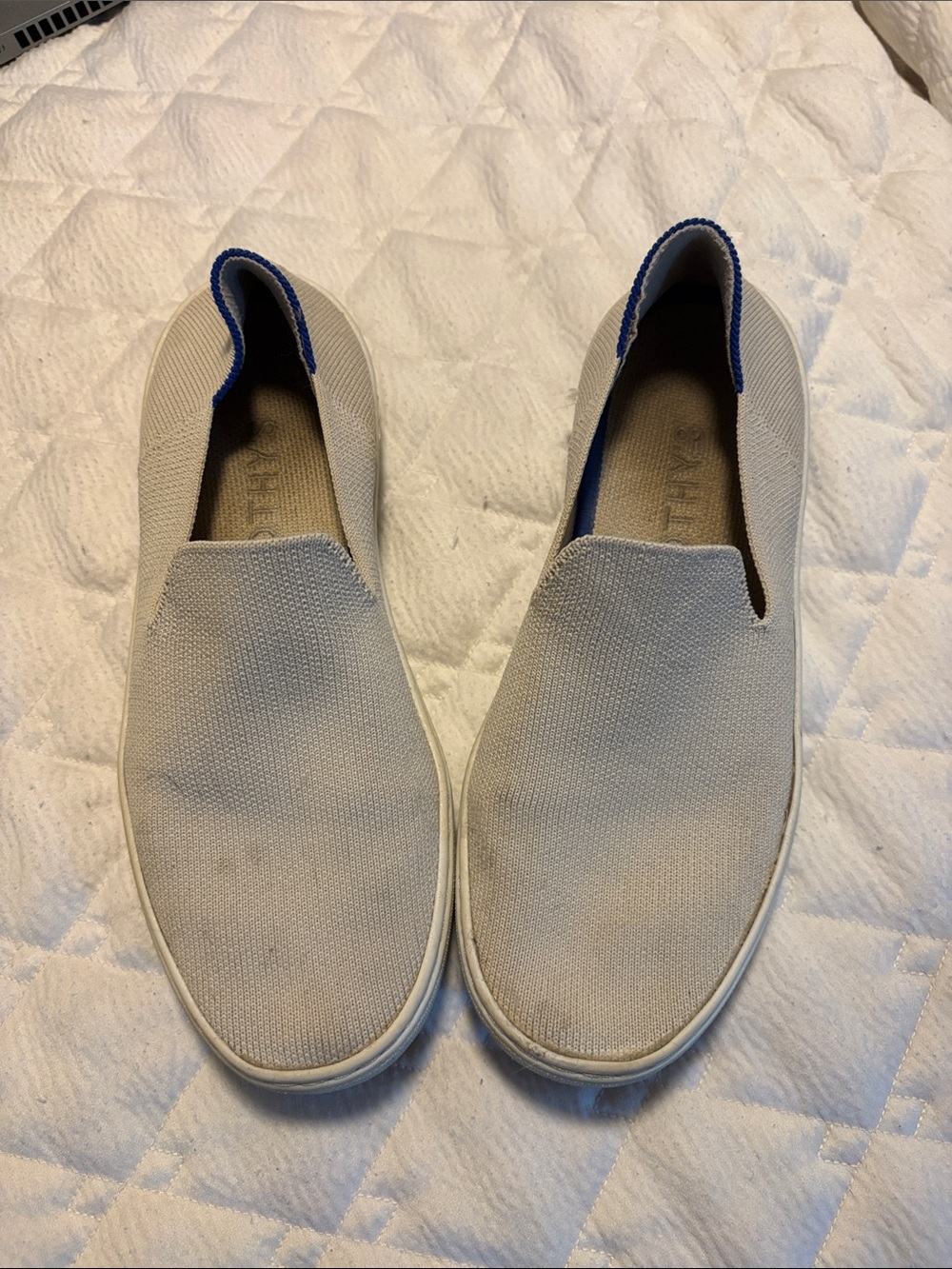 Women’s size 7 white rothy slip ons